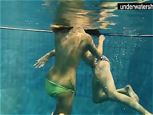 2 luxurious amateurs demonstrating their bodies off under water